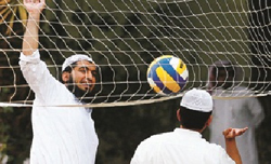 Former al Qaeda operatives play volleyball at the rehabilitation centre